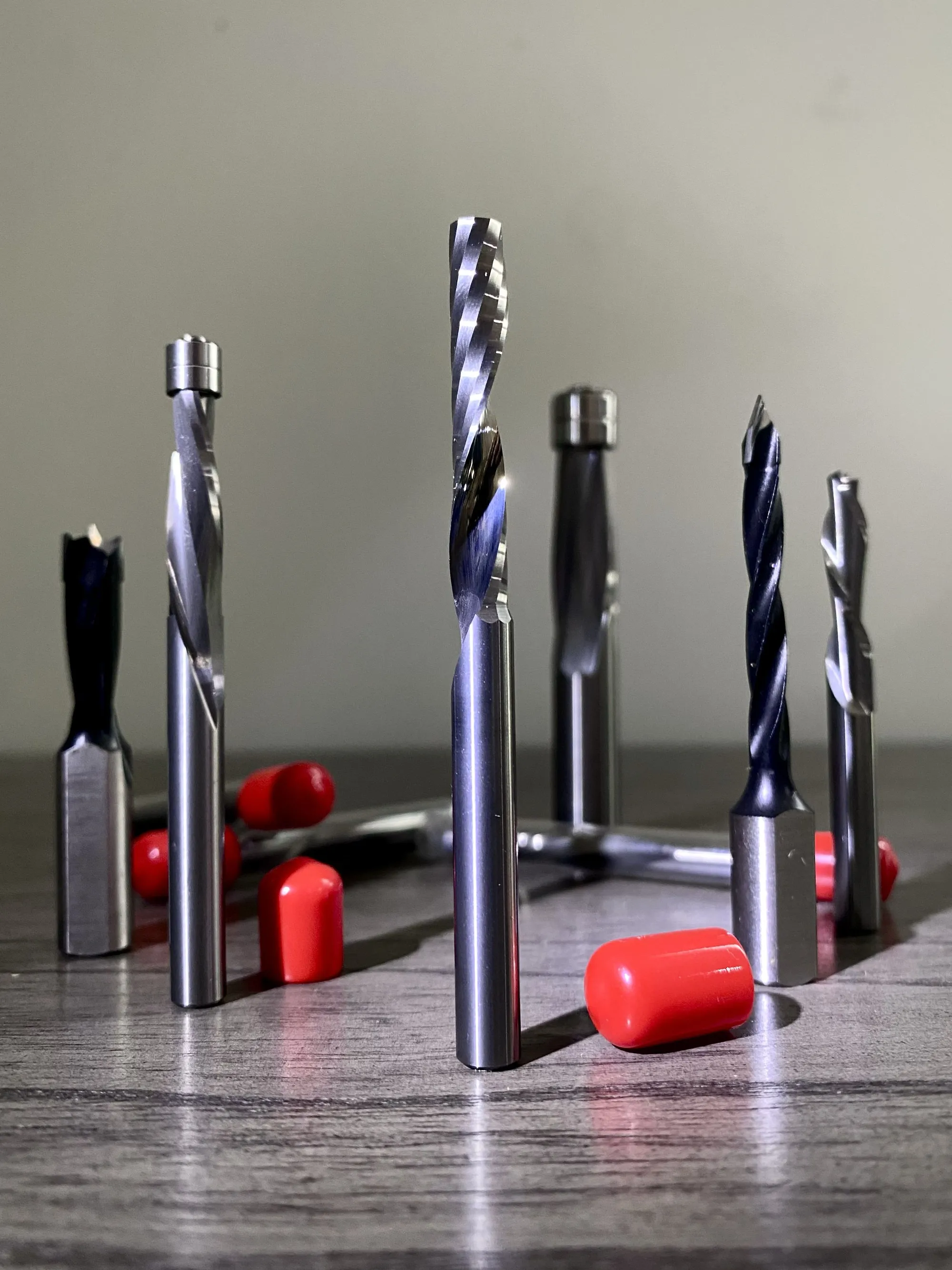 Solid carbide spiral router bits sharpened by Byler Industrial Tool